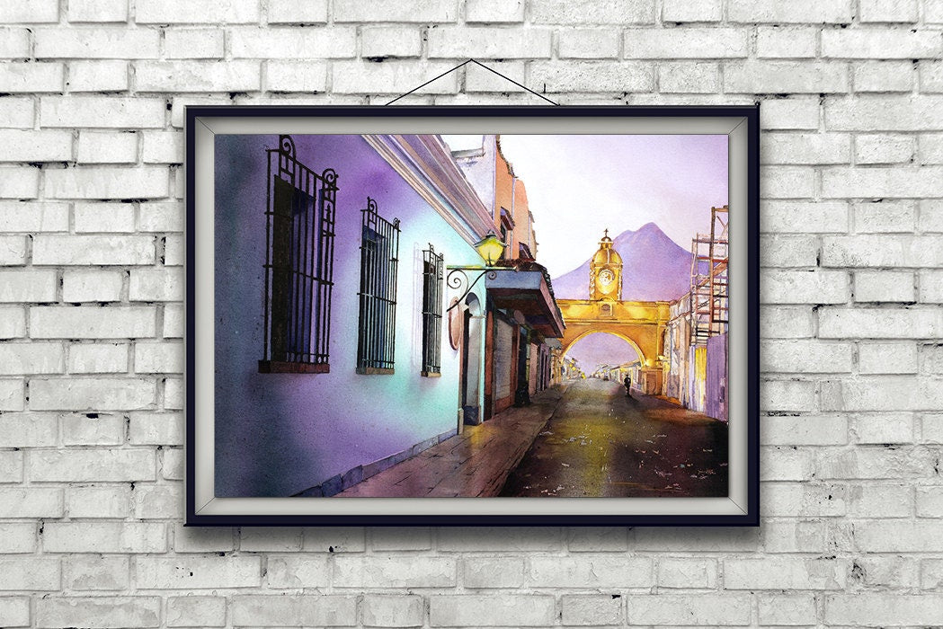 Original watercolor painting of the Arch of Santa Catalina in the city of Antigua, Guatemala, with vibrant colors and historic architecture—perfect wall art for home interiors.
