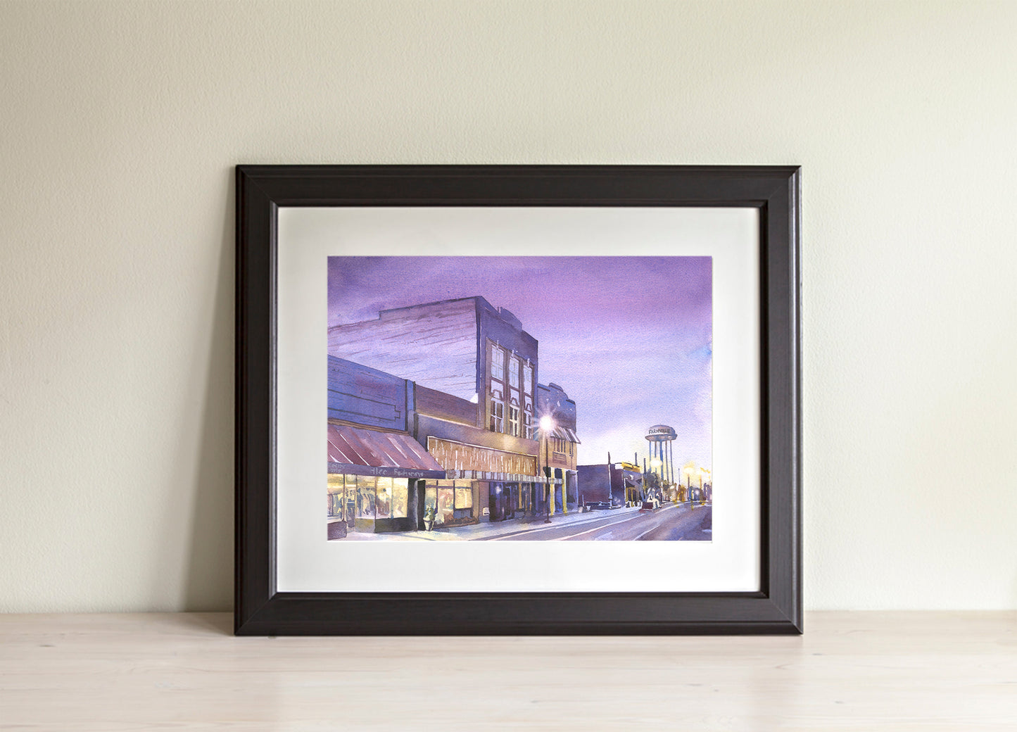 Watertower and storefronts of Farmville, NC. Watercolor painting small town America street scene purple yellow sunset (print)