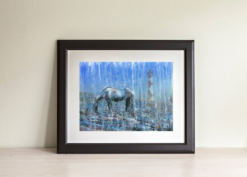Cape Lookout lighthouse and grazing horse in the Outer Banks, North Carolina. Colorful blue artwork Cape Lookout lighthouse OBX artw (print)
