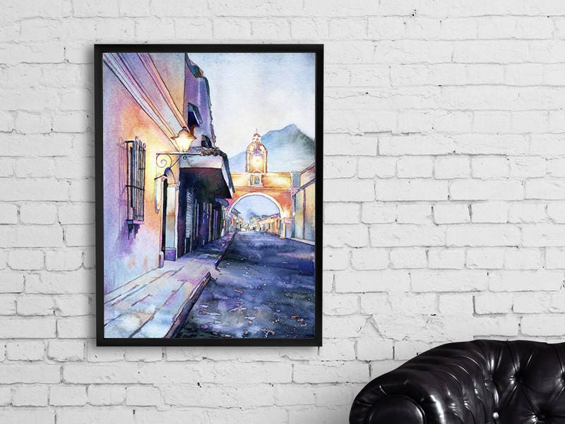 Antigua Guatemala watercolor fine art landscape painting featuring the iconic Arch of Santa Catalina with cobblestone streets and mountain backdrop—ideal travel wall decor.