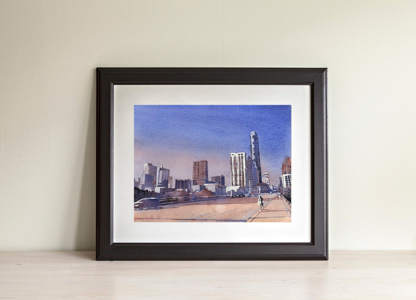 Austin Texas skyline artwork in soft watercolor, showcasing downtown buildings and the Capitol dome framed by a vivid blue sky—ideal interior design piece.