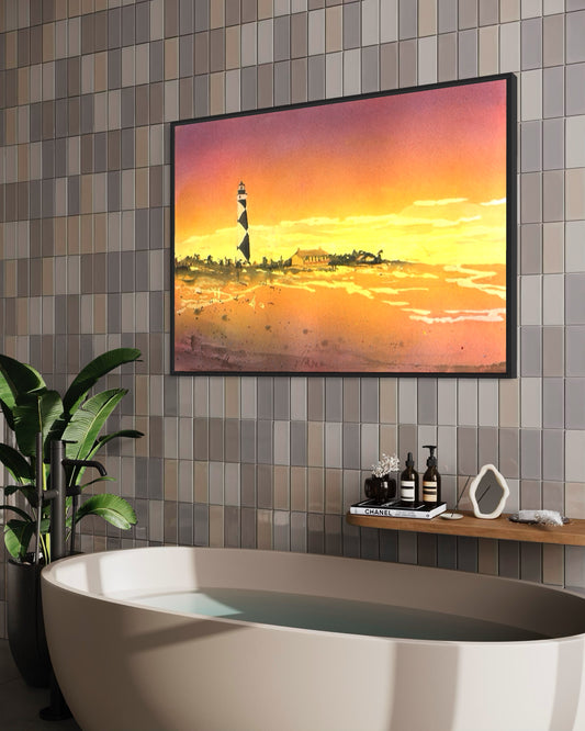 Colorful watercolor painting of Cape Lookout lighthouse at sunset, a handmade artwork ideal for coastal interior design, beach home wall decor, or a thoughtful travel gift from the Outer Banks NC.