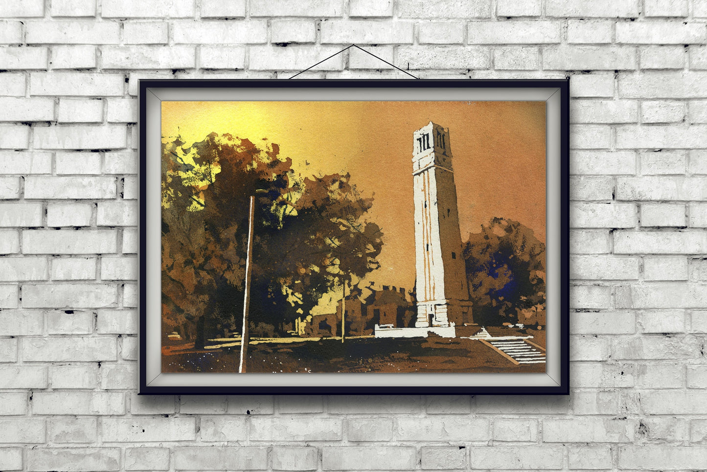 NCSU Bell-Tower in Raleigh, NC at dusk. NCSU artwork bell tower orange painting North Carolina Statue University belltower campus Wolfpack (print)