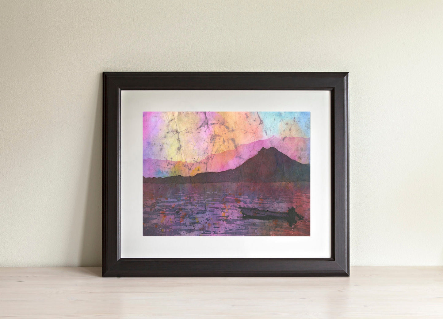 Boat at sunset on lake.  Batik painting of boat and volcano at Lake Atitlan, Guatemala.  Colorful watercolor landscape art volcano artwork (print)
