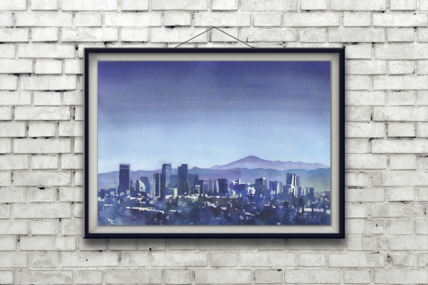 Denver, Colorado skyline at dusk with mountains in background.  Denver CO skyline blue watercolor art Denver city artwork blue landscape art (print)